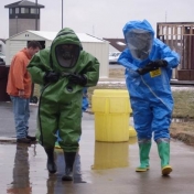 EHS Interns in Level A Personal Protective Equipment